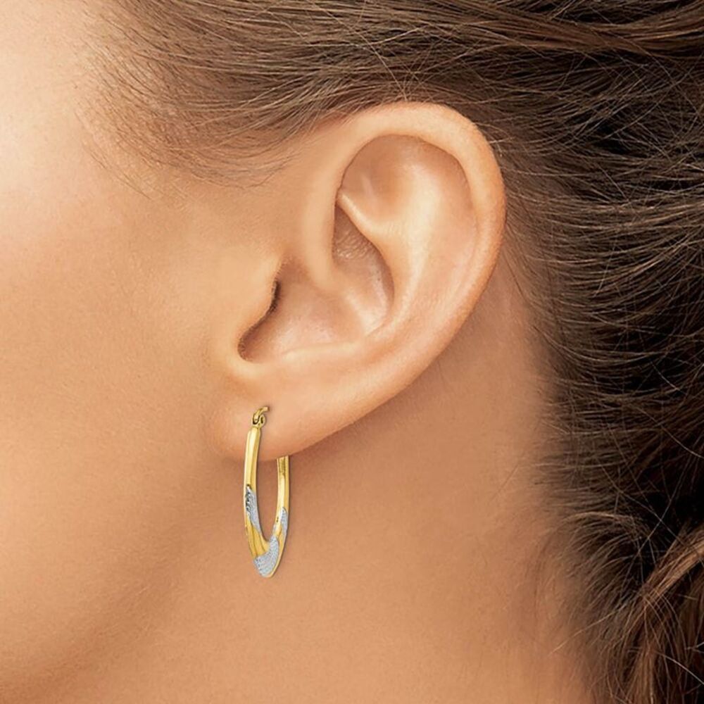 Two-Tone Oval Hoop Earrings in 14k Yellow Gold and Rhodium - Picture 3 of 5